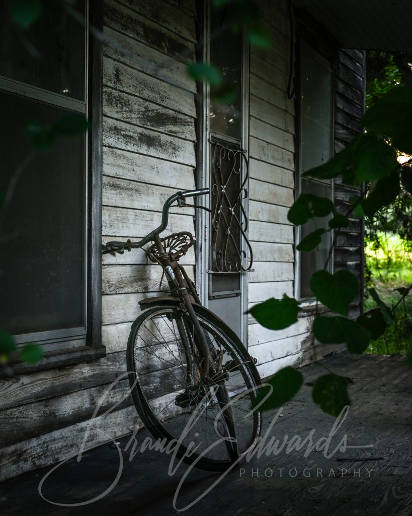 forgotten porch photo with bike